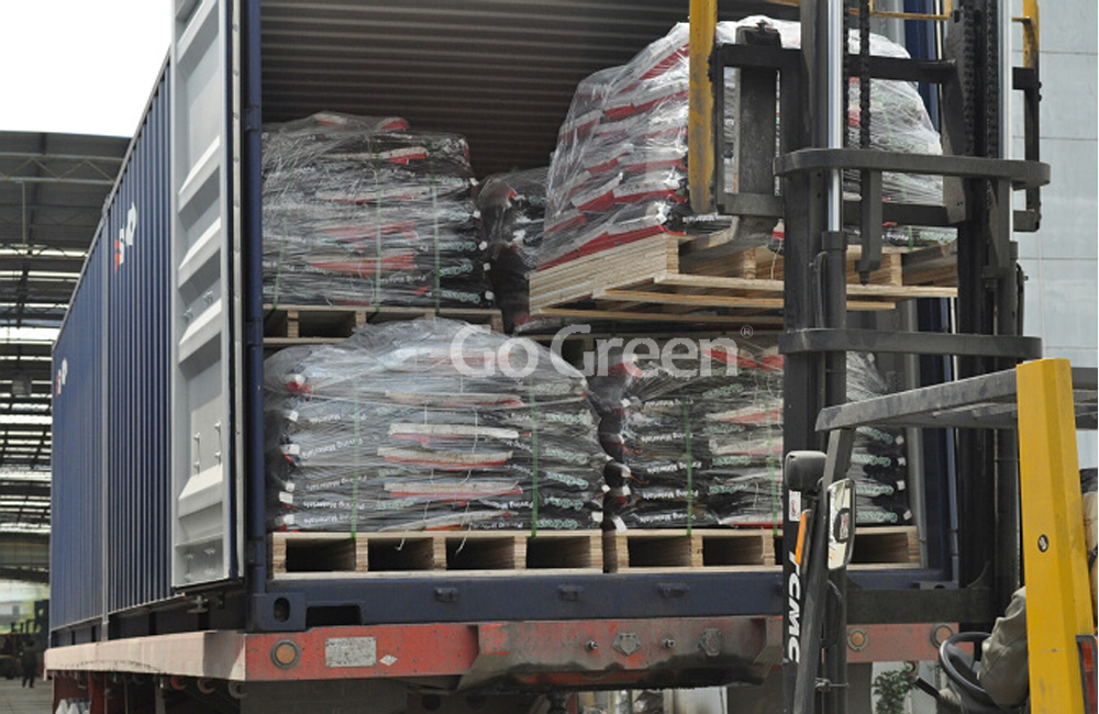 Bagged cold mix asphalt container loading